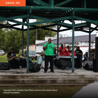 A man performs at a bandstand in a park in Drew, Mississippi